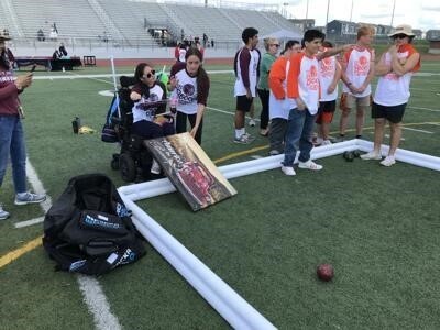 Students play bocce ball