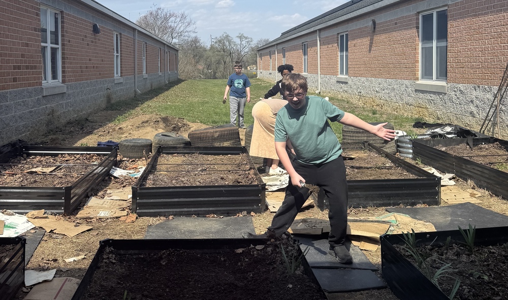 Students working in the garden at ESI