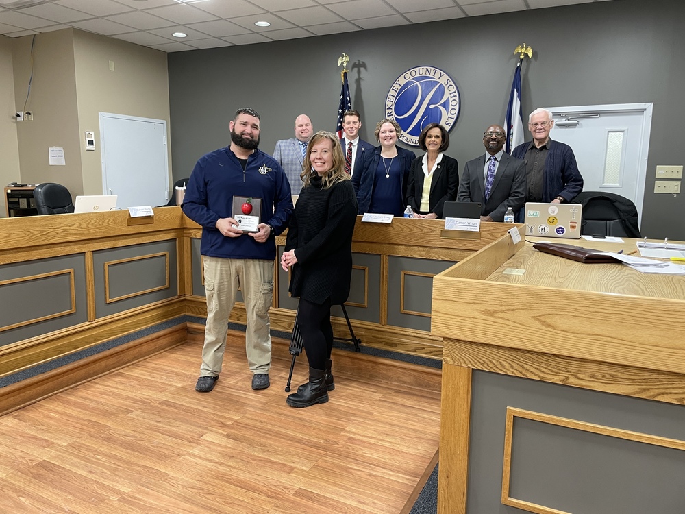 Josh Oldham, Angie Millieman, Ryan Saxe, and members of the board