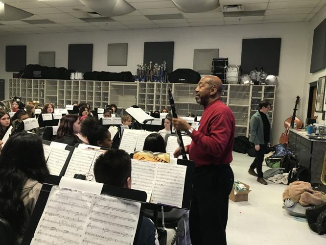 Quincy Hilliard works with students from Martinsburg South Middle School.
