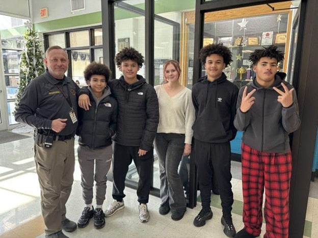 Martinsburg South Middle School Safety Officer with a group of students.