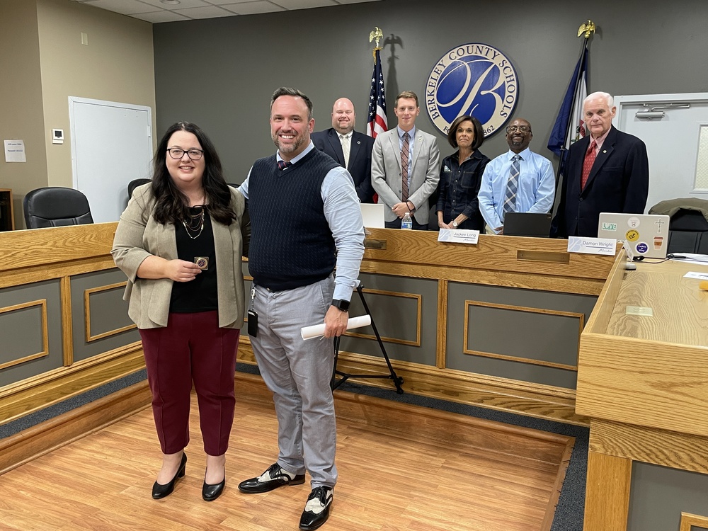 Melissa Hollen, Tyler Long, Dr. Saxe, and members of the board