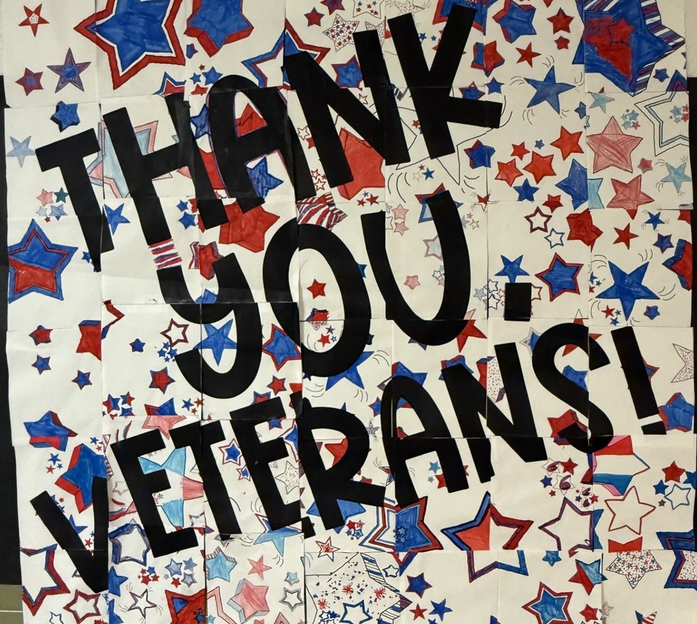 a sign that says "Thank you Veterans."