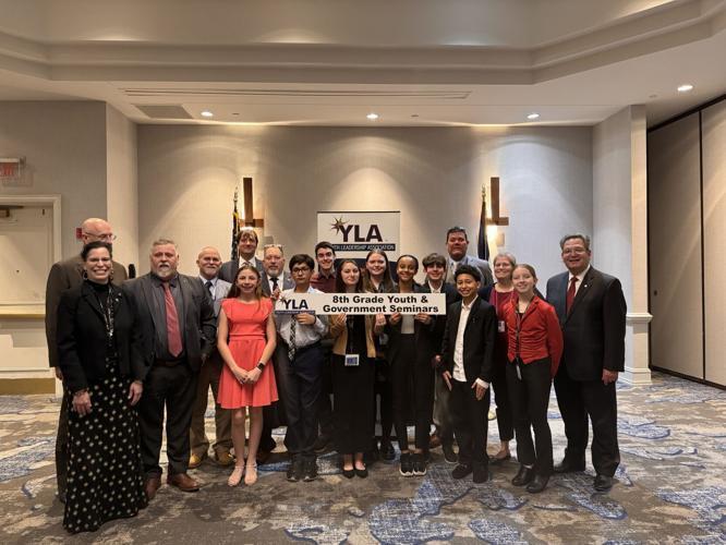 image of bcs students participating in the youth in government conference standing with the berkeley county delegation