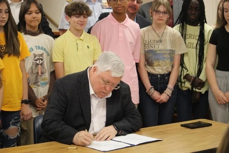 Gov. Morrisey signing Troops to Teachers 