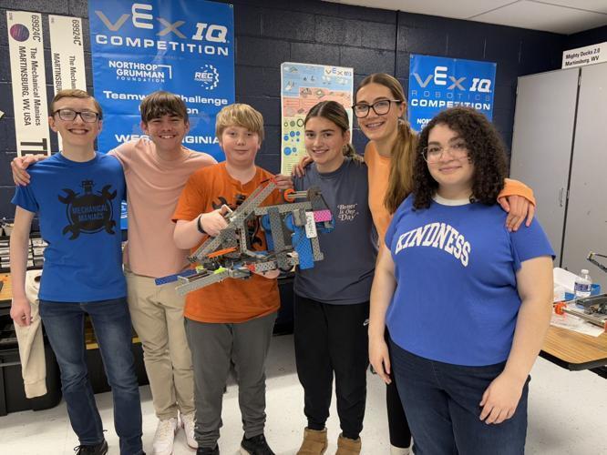 Pictured, from left, are Cameron Smith, Jackson Painter, Kolton Cole, Olive Bird, Olivia Campbell and Leah Miller with their robot, the Maniac.