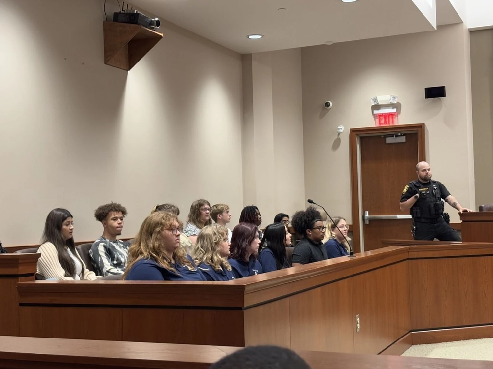 Students sit in the jury booth as they watch the mock trial at the Berkeley County Judicial Center.