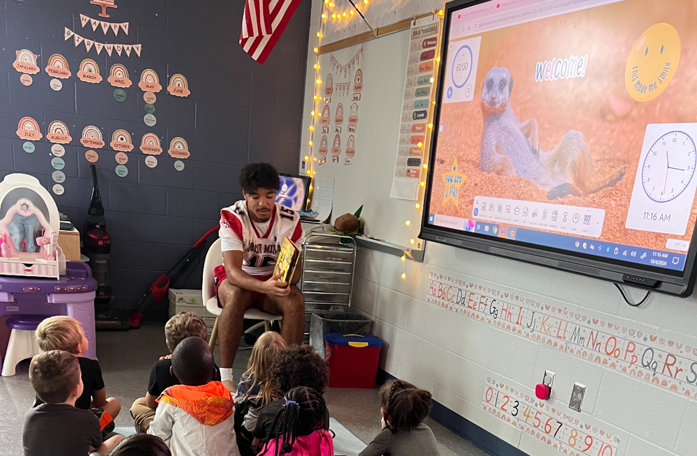 Max Anderson reading to pre schoolers