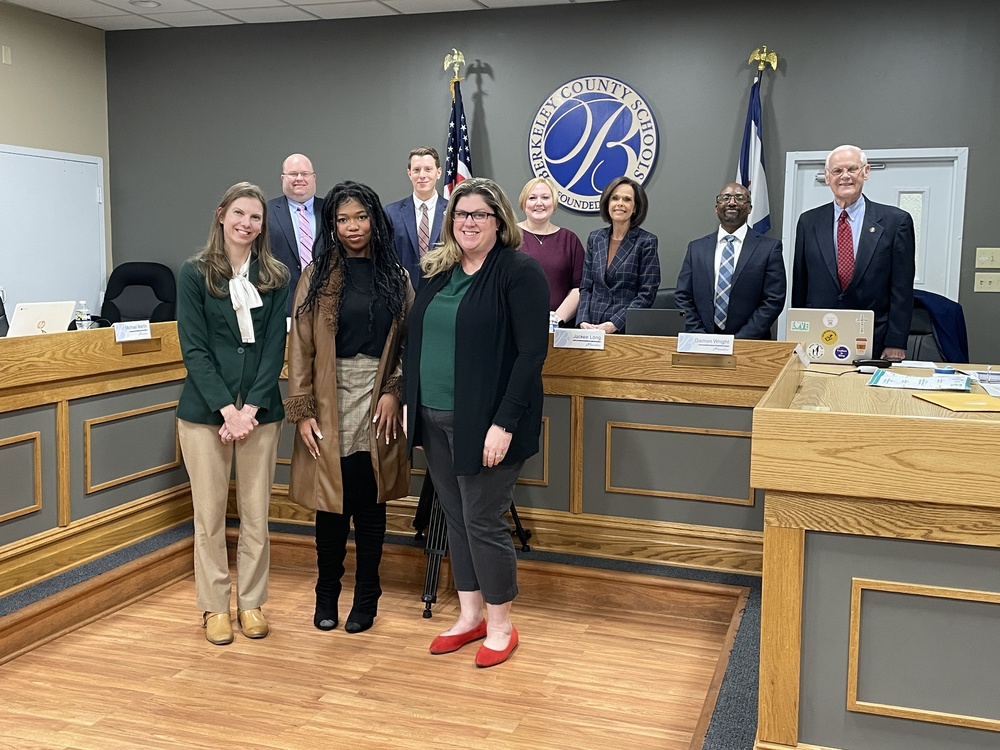 Jordan Dube, Alicia, teacher, Dr. SAxe, and members of the board