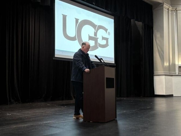UGG North America Sales Director Dave Gruver addresses Martinsburg High School students