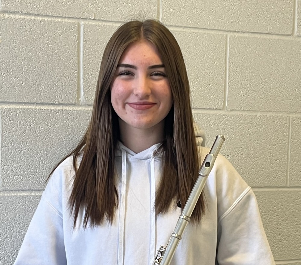 NMS student Aubrie Souers posing with her flute.