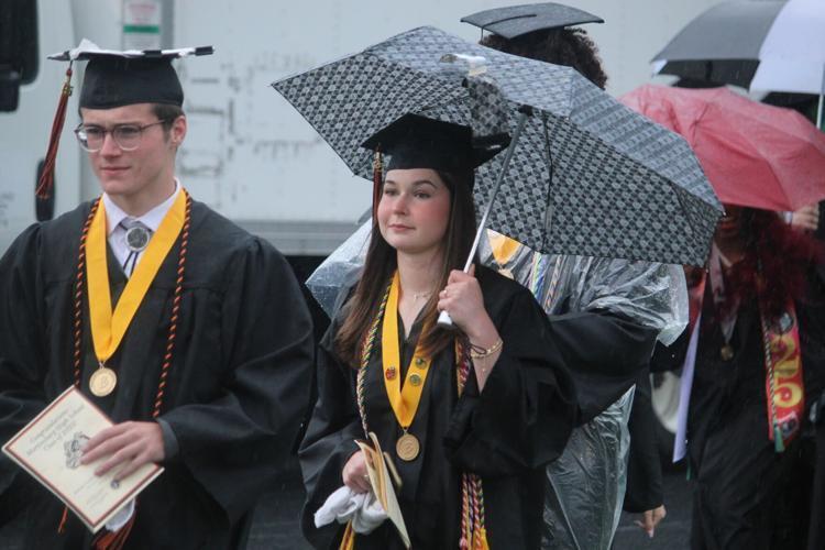 students walking on to the field