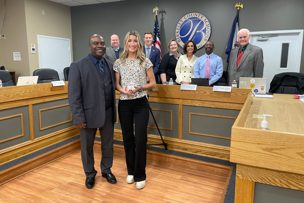 Lindsey Wertz, Paul Baker, Superintendent, and board members