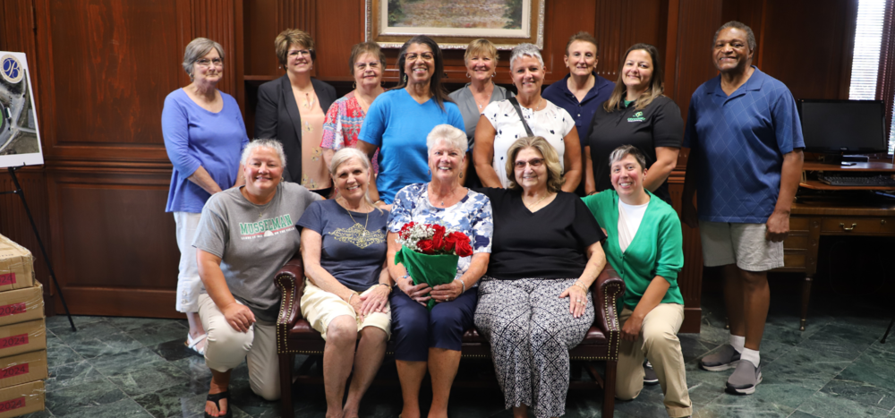 Carol Kamensky with group of women she helped
