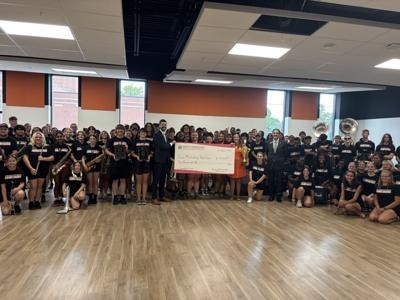 Martinsburg High School band with the Shenandoah Apple Blossom Sweepstakes check for $10,000