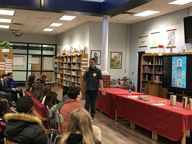 Jordan Sonnenblick speaks to seventh-grade students at Spring Mills Middle School on Tuesday.