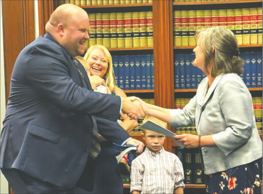 Dr. Ryan Saxe getting sworn in as superintendent