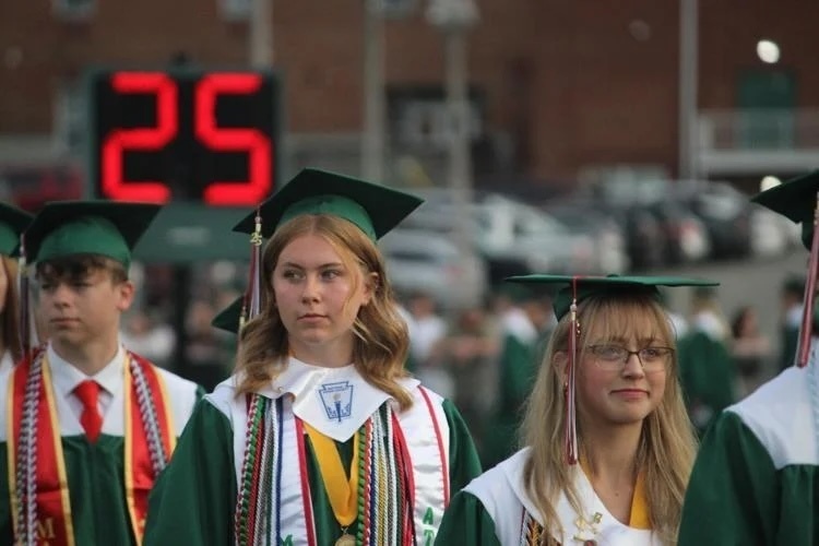 Musselman Students walking on to the field