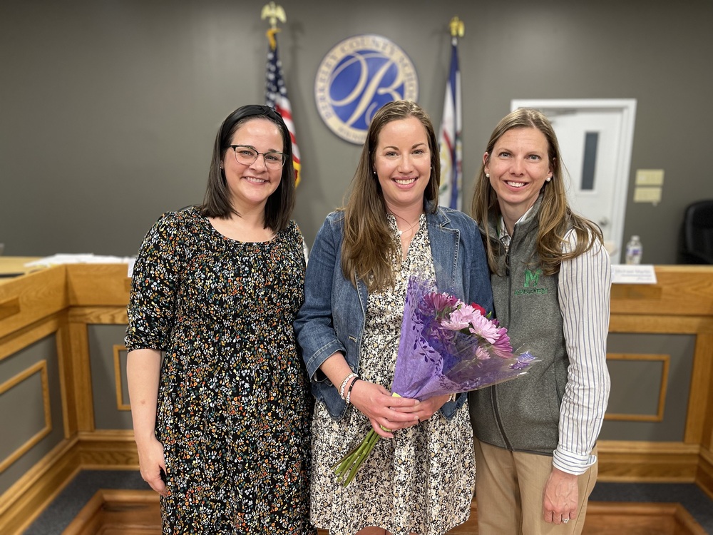 image of sara porter receiving award from principal