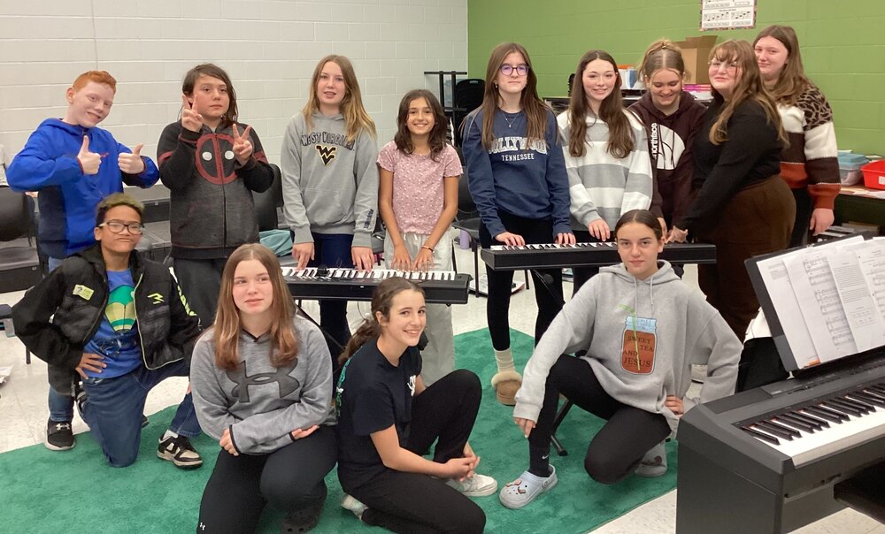 students playing with piano's