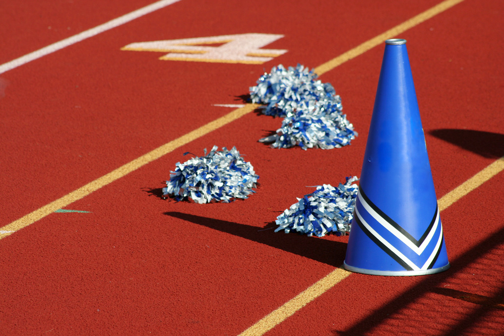 image of cheerleading equipment on a track