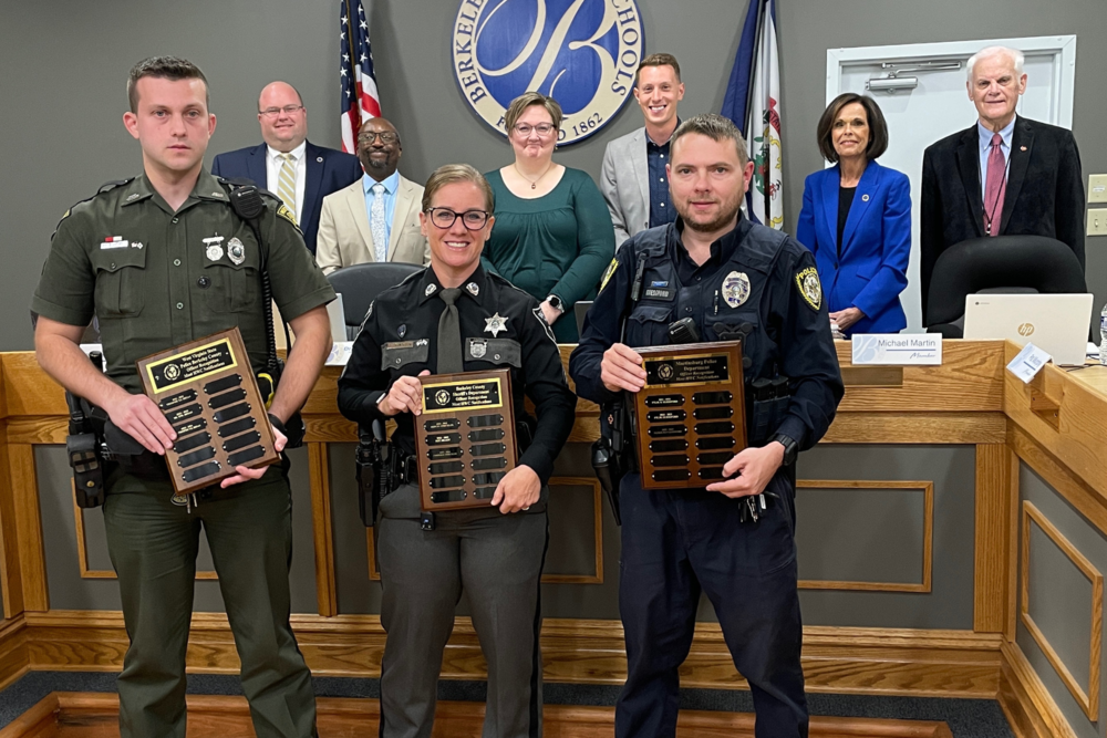 Corporal Strickler,  Patrolman Guessford, and Sr. Trooper T.G. Bryan with Superintendent Saxe and members of the board