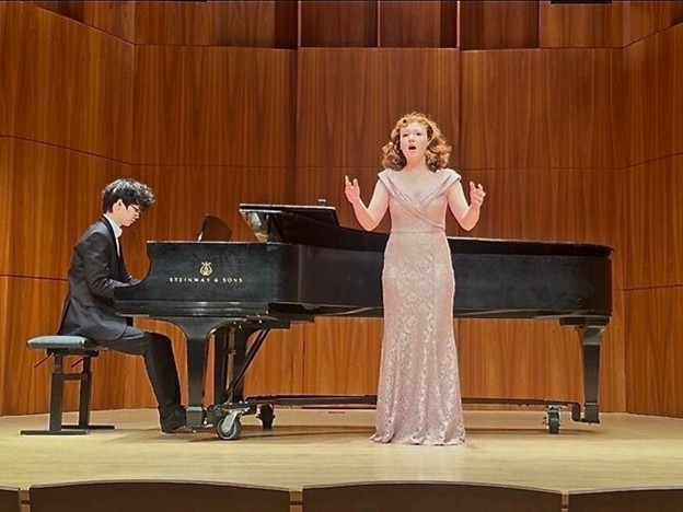 Martinsburg native Ava DiPasquale performs for an audience at her collete, the Eastman School of Music