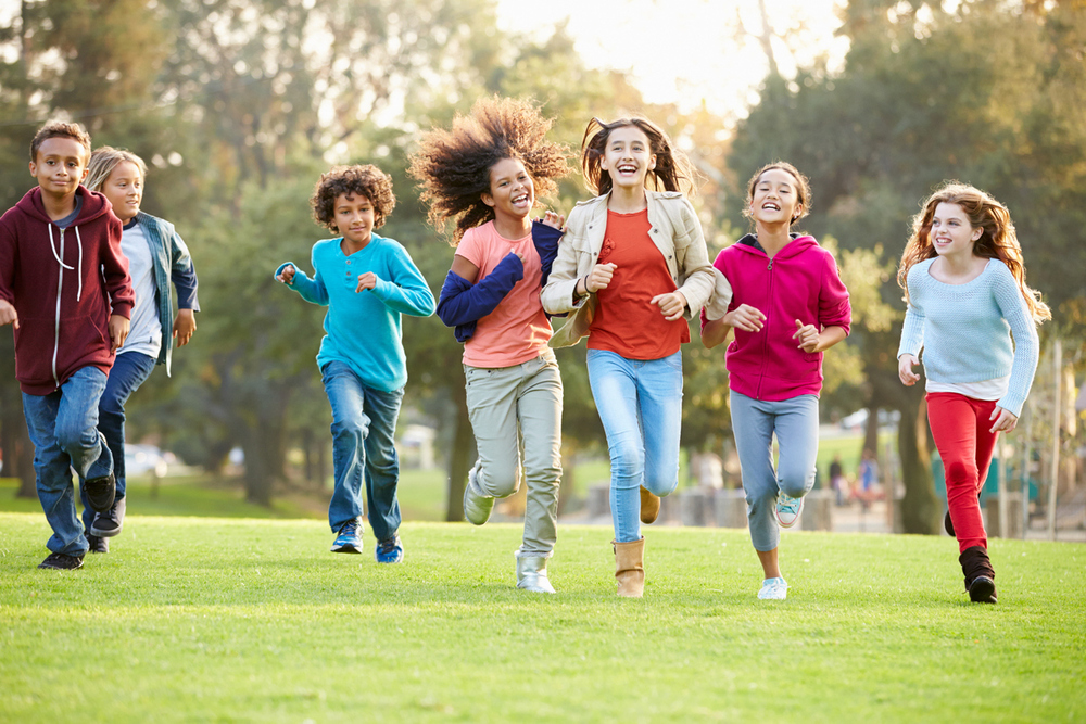 Stock image of kids running
