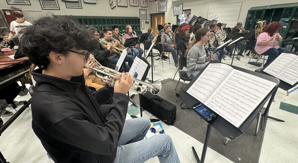 students playing on new instruments