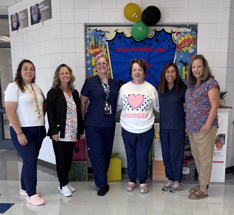 The school counselors all dressed like nurses with our Nurse, Ms. Failes.