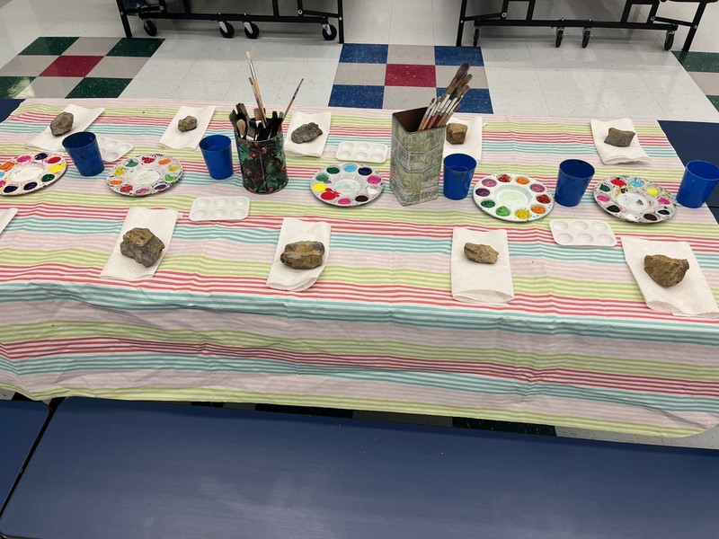 the Kindness Club station where students could paint rocks