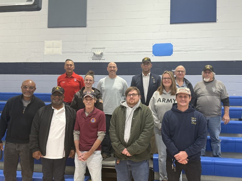 a picture of several veterans who attended the Veterans Day Assembly
