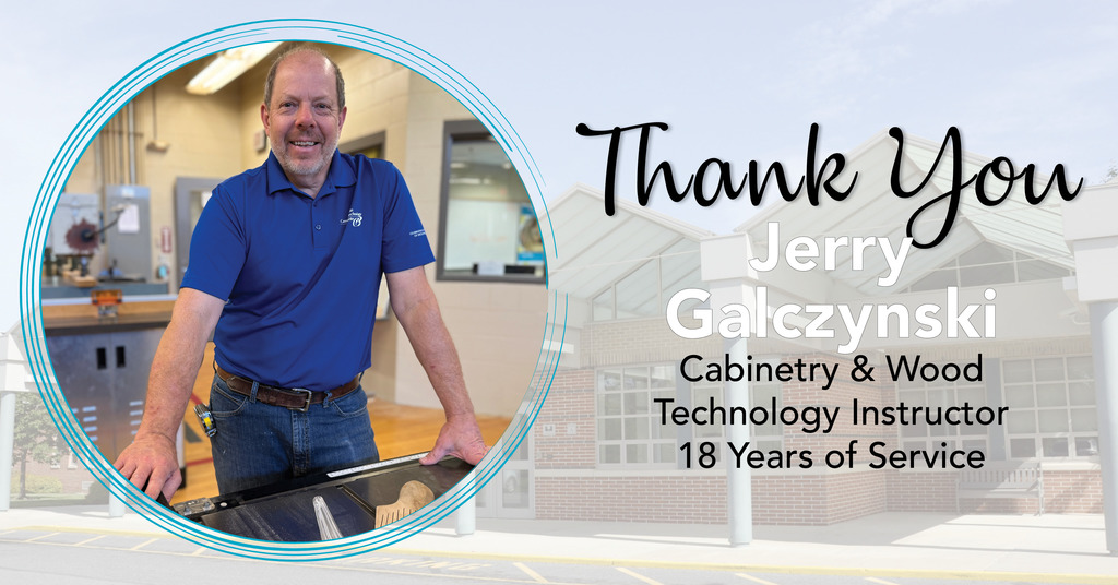 A man in a blue polo shirt and jeans stands in a workshop with tools and equipment in the background. To the right, text reads: 'Thank You Jerry Galczynski, Cabinetry & Wood Technology Instructor, 18 Years of Service.' Behind the text is an exterior view of a building with large windows and columns.
