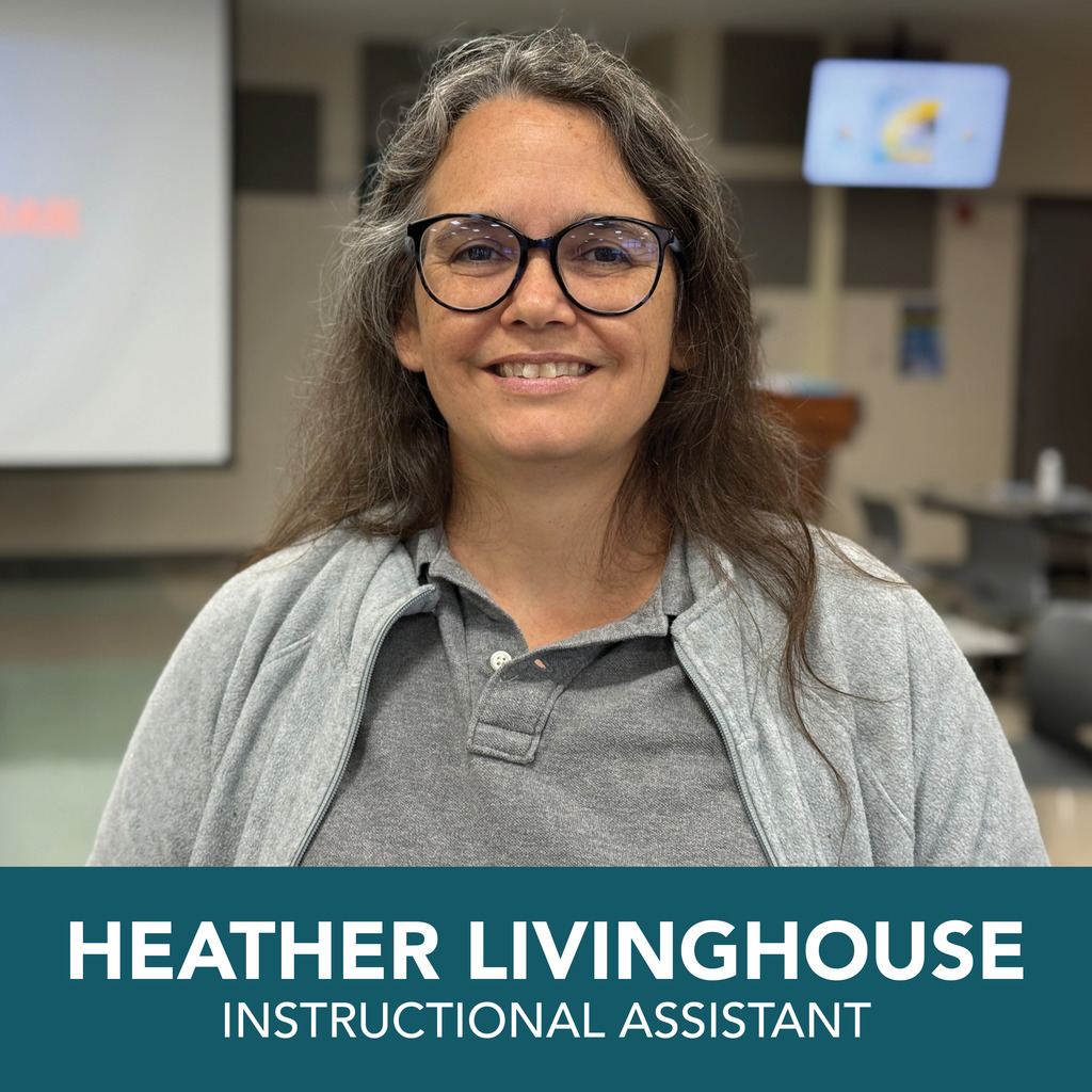 A person with long hair is shown wearing a gray shirt and jacket, standing in an indoor setting that resembles a classroom or office. Their face is blurred for privacy. At the bottom of the image, text reads: "HEATHER LIVINGHOUSE INSTRUCTIONAL ASSISTANT."