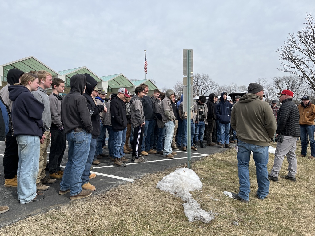 Electrical Occupations students listen as industry professionals speak during the site visit.