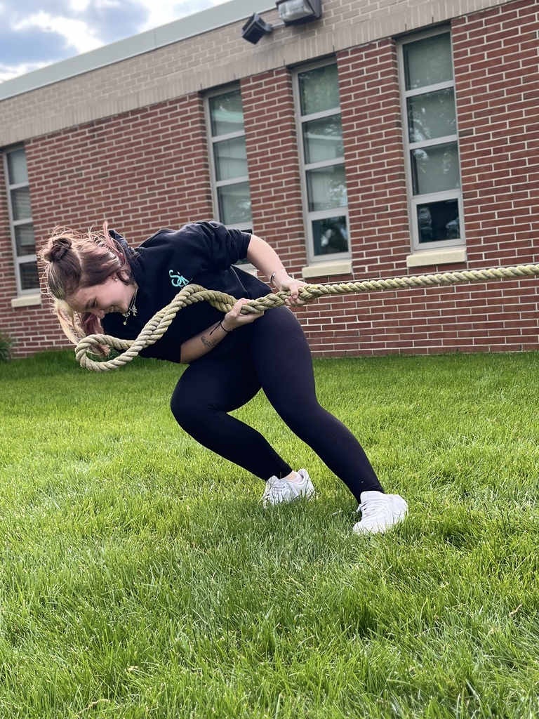 Student pulls hard on a tug-of-war rope outside BCTC during the Summer Sendoff.