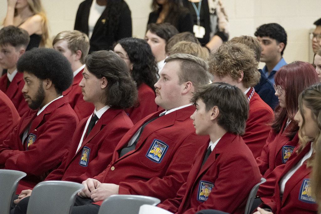 SkillsUSA students in red blazers sit together during the BCTC Joint Operations Committee recognition.
