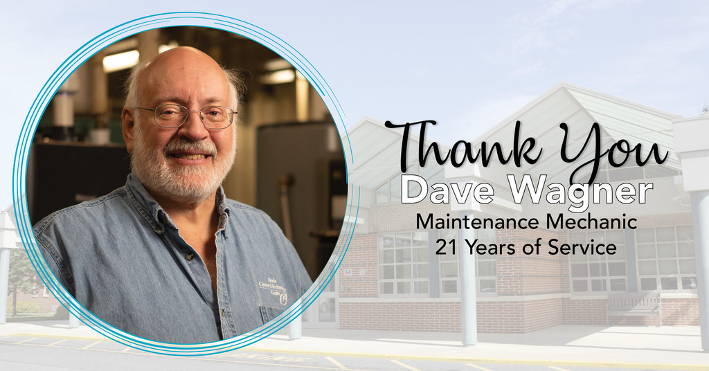 Dave Wagner, wearing a blue BCTC work shirt, smiles in a maintenance workspace. The graphic reads, “Thank You Dave Wagner, Maintenance Mechanic, 21 Years of Service,” over a faded image of the BCTC campus.