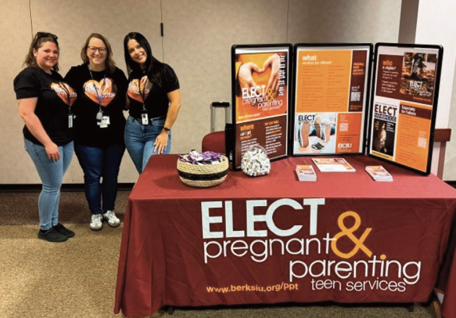 Elect Employees standing by their booth