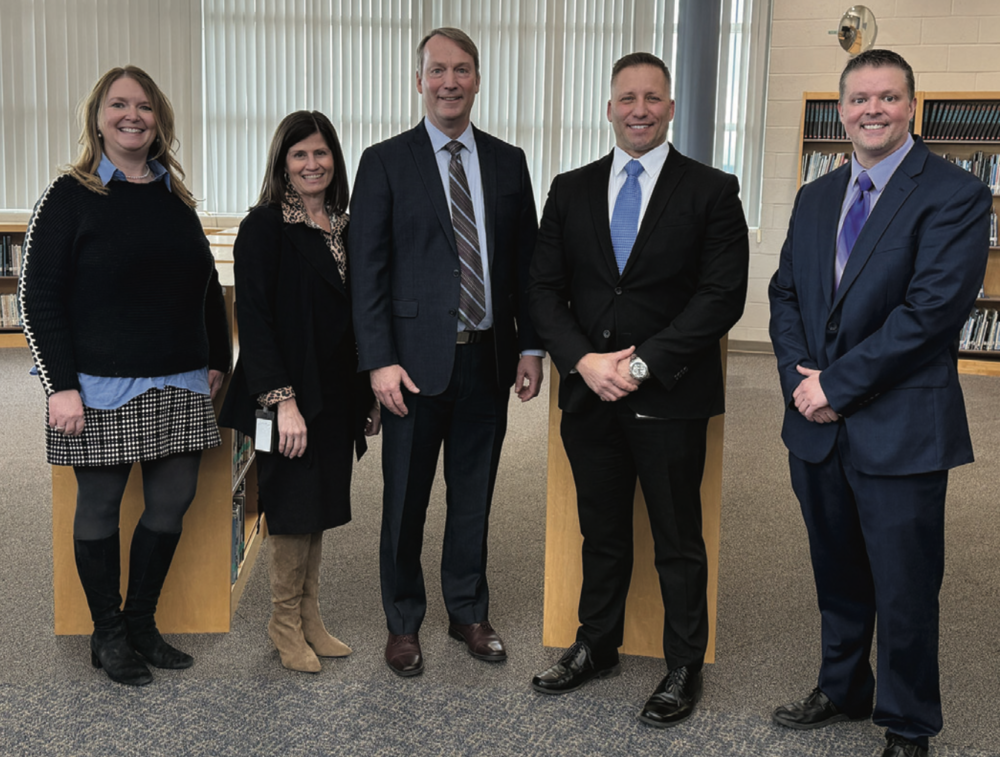 Dr. Richards in center, along with event attendees