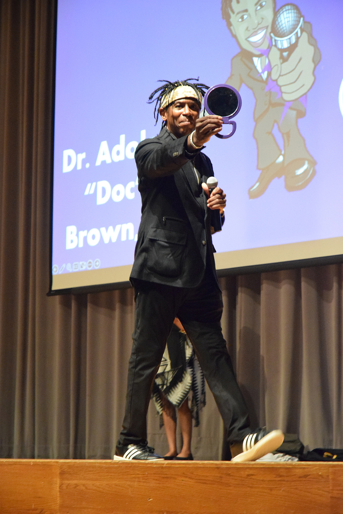 Doc Brown holding mirror