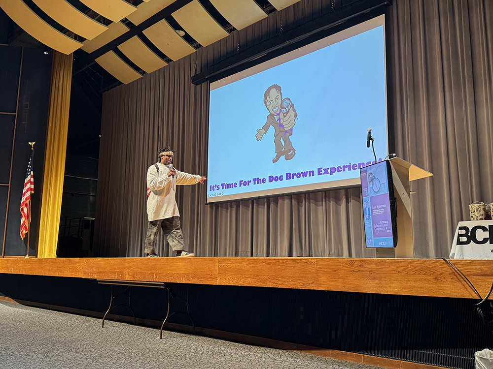 Doc Brown Presenting on Stage