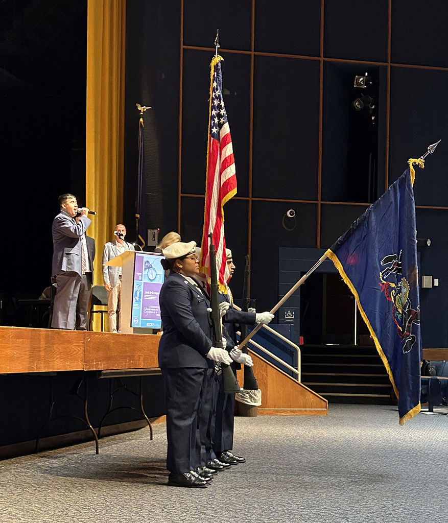 Muhlenberg ARJROTC presenting colors and singing National Anthem