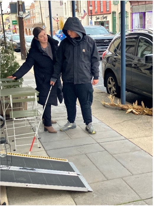Student and teacher during a community-based mobility session.