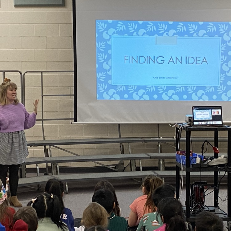 women in front of screen