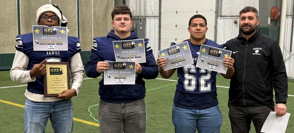 football players standing in a group