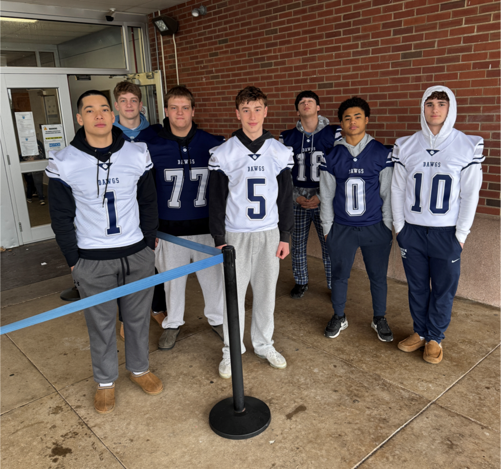 football players standing in a group