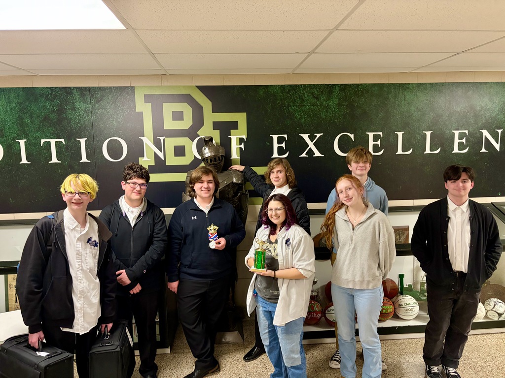 Quiz Bowl team standing in group