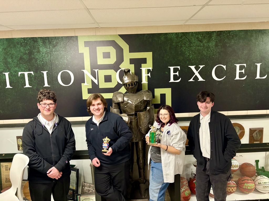 quiz bowl A-team standing in a group