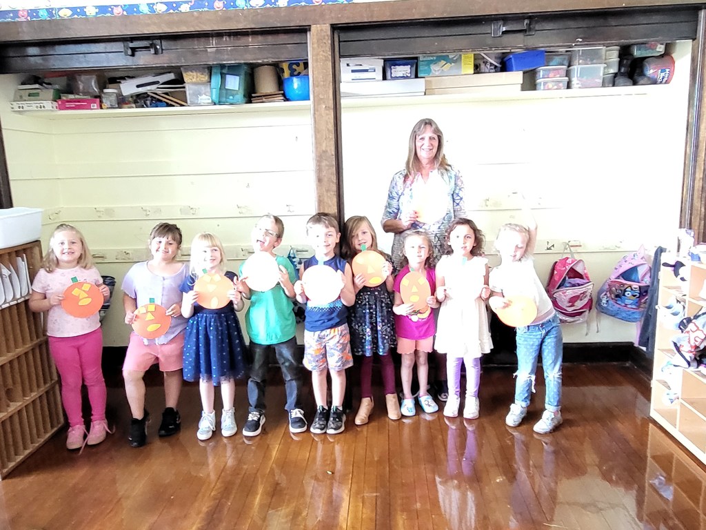 Mrs. Williams class making Shape Pumpkins